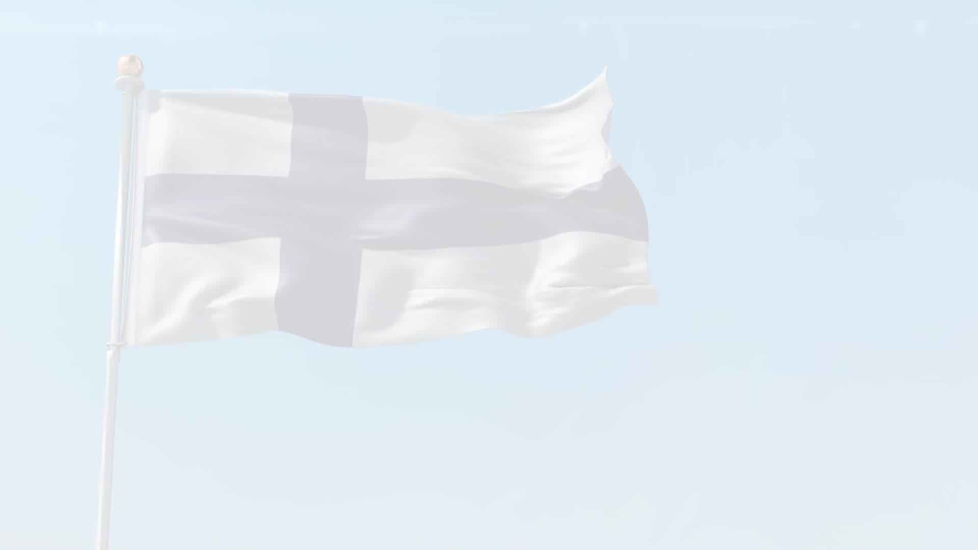 Liehuva Suomen lippu, taustalla vaaleansininen taivas.